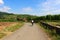 A woman biking through Alsace