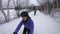 Woman biking in winter on fat bike. Fat biker riding bicycle in the snow in winter. Selfie video by woman living healthy