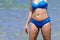 Woman with bikini blue show body at Ban Krut Beach