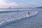 Woman and bikini happy wave on beach