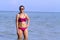 Woman and bikini pink show body beautiful on beach