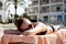 woman in bikini relax on sunlounger sunbathing