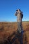 Woman with binoculars birdwatching,