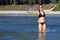 Woman with black bikini show shape large on beach