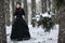 Woman in black Victorian dress