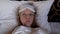 Woman Blogger Lying in Bed with Sleeping Mask and Use Camera Recording for Vlog