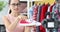 Woman blogger shows red sneakers from new sports collection to camera 4k movie