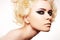 Woman with blond hair and rock evening make-up