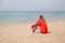 Woman blonde drinks tea on the Beach Ocean coast