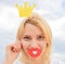 Woman blonde hair hold cardboard tiara or crown and red lips symbol of love sky background. Dream of every girl to