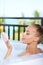 Woman blowing bubbles in bubblebath