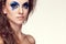 Woman with blue artistic fashion make up