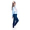 Woman in blue sweatpants sport style casual standing looking smiling