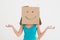 Woman in blue tank top with smiley cardboard box over face