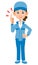 Woman in blue workwear holding index finger