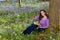 Woman in bluebells forest