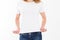 Woman body in empty white t-shirt mockup closeup isolation