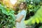 Woman botanist at work in a botanical garden