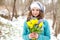 Woman with a bouquet of flowers at the park