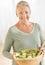 Woman With Bowl Of Salad At Home