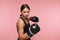 Woman Boxer In Gloves Training On Pink Background