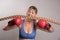 Woman boxer with red boxing gloves