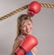 Woman boxer with red boxing gloves