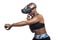 Woman Boxing in VR with a Virtual Reality Headset and Controllers
