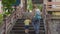 Woman and a boy walk through the Long Son pagoda in Nha Trang, Vietnam