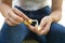 Woman breaking cigarette in outdoor