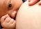 Woman breastfeeding baby stock photo