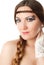 Woman bride with creative make-up and braid