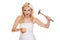 Woman bride with hammer about to smash piggy bank