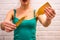 Woman with a broken kitchen wooden spatula