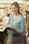 Woman Browses in a Bookstore