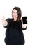 Woman brunette showing black screen empty mobile phone and making thumbs up