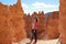 Woman in Bryce Canyon looking and enjoying view