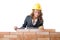 Woman builder measuring isolated