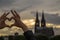 Woman builds love sign in front of the cologne cathedral