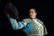 Woman bullfighter salutes with his montera