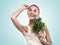 Woman with a bundle of fresh mint. Concept vegetarian dieting -