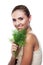 Woman with bundle herbs (dill)