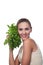 Woman with bundle herbs (salat)