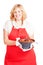 woman with bundt cake and red apron