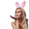 Woman with Bunny Ears Blowing Kiss. Easter