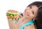Woman with burger sandwich