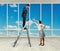 Woman and businessman on stepladder