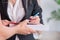 Woman businesswoman receiving mail parcel from courier