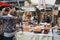 Woman buying cakes at Greenwich Market, London, UK