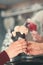 Woman buying couple scoops of  ice cream in a candy shop